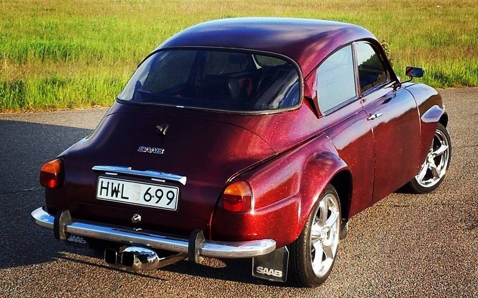 A Fire Red Flake Saab from SWEDEN.