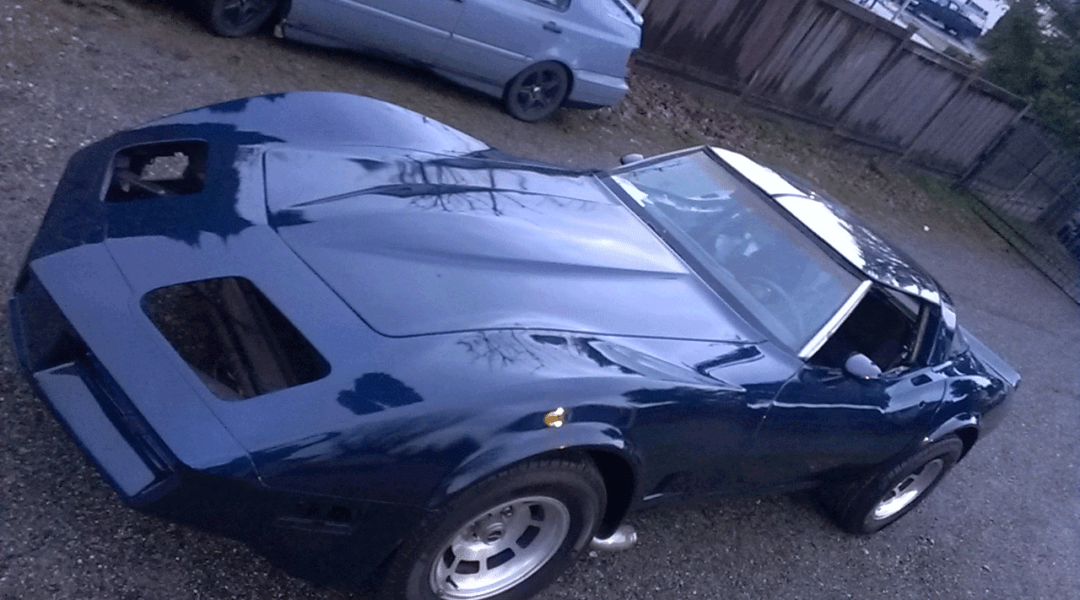Electric Blue Corvette painted over black base coat. True Custom Paint.