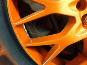 Orange candy rim with gold ghost.