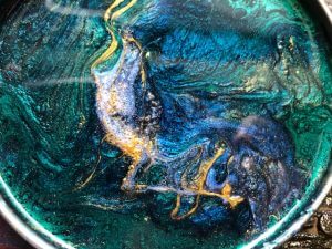 Epoxy resin pearls poured into a jar lid to make a cool coaster. All PWP products work in Epoxy Resin!