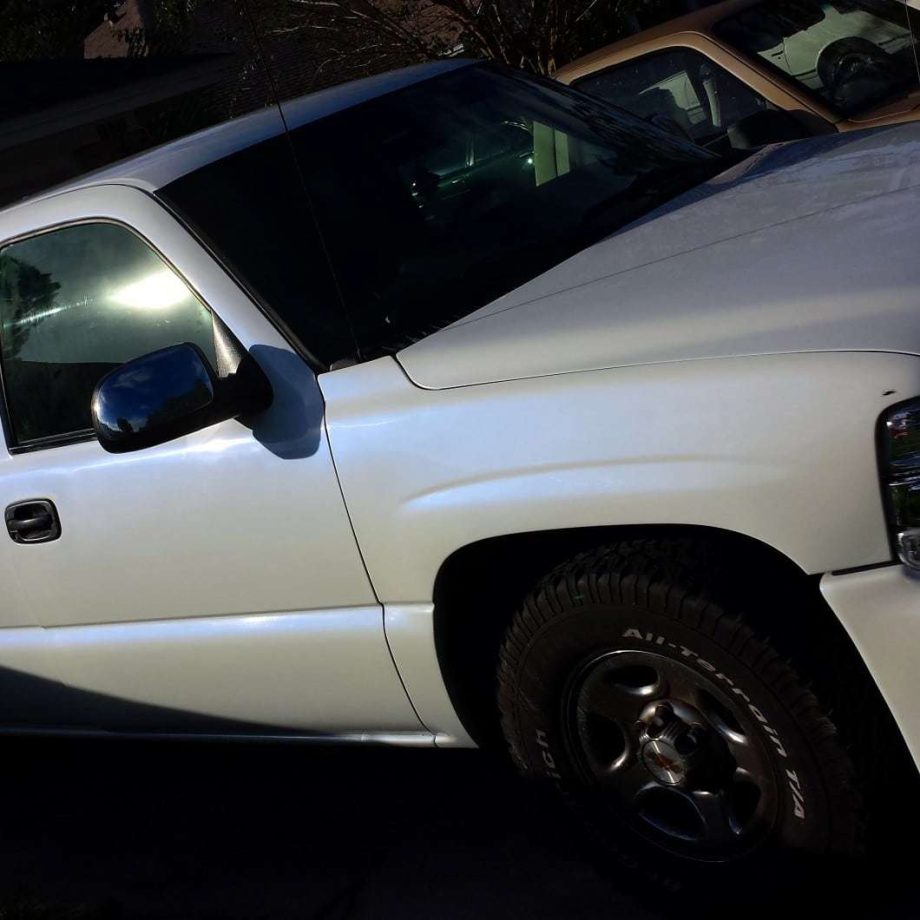 Blue ghost pearl on a white truck