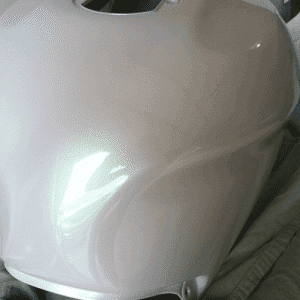 Green Shimmer Ghost Pearl Custom Painted Motorcycle tank.