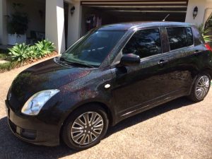 Black holographic flake on a customer's car.