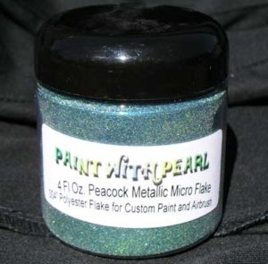 Peacock Metal Flake combines blue and gold flakes to make a mysterious green hue.